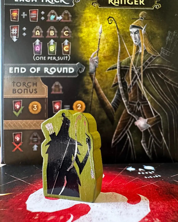 Componenti e carte di Torchlit sul tavolo